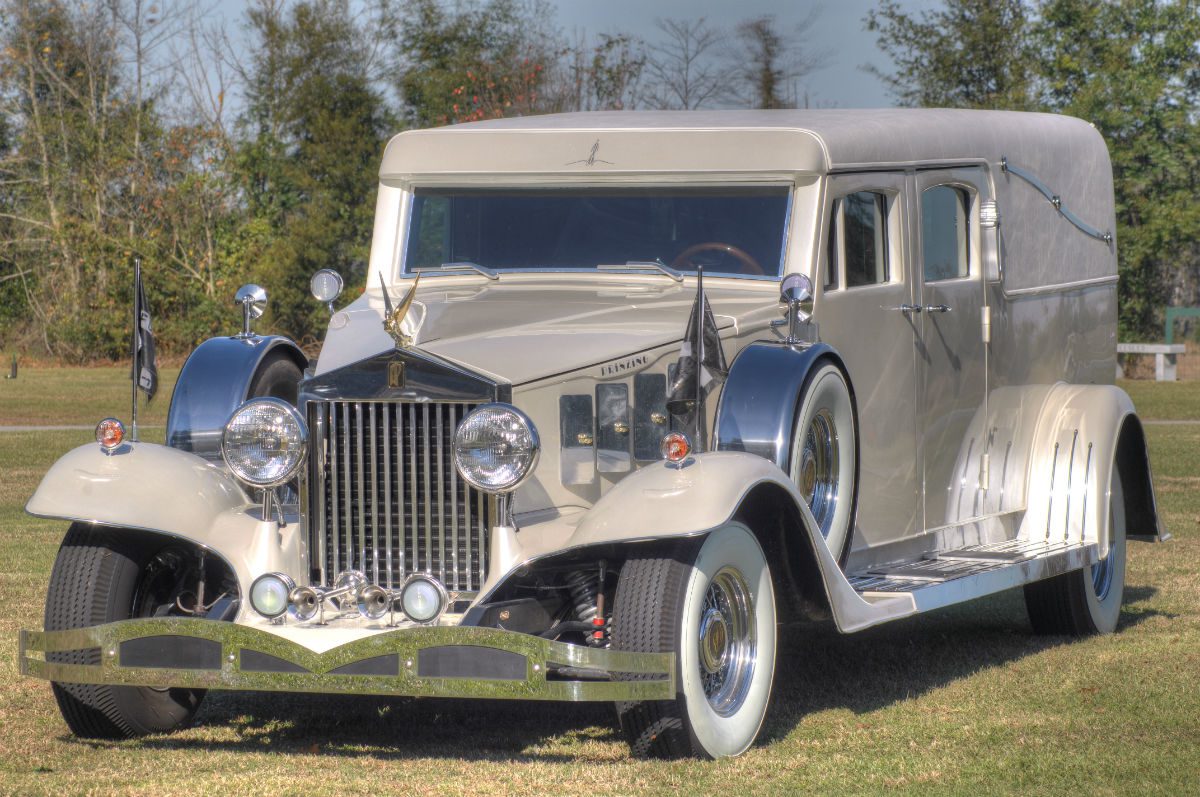 front view of white rolls royce hearse