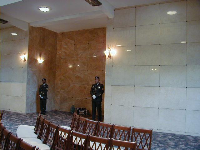 service men and seating inside a mausoleum