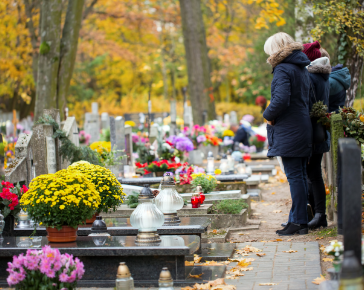 People visiting cemetery People visiting cemetery