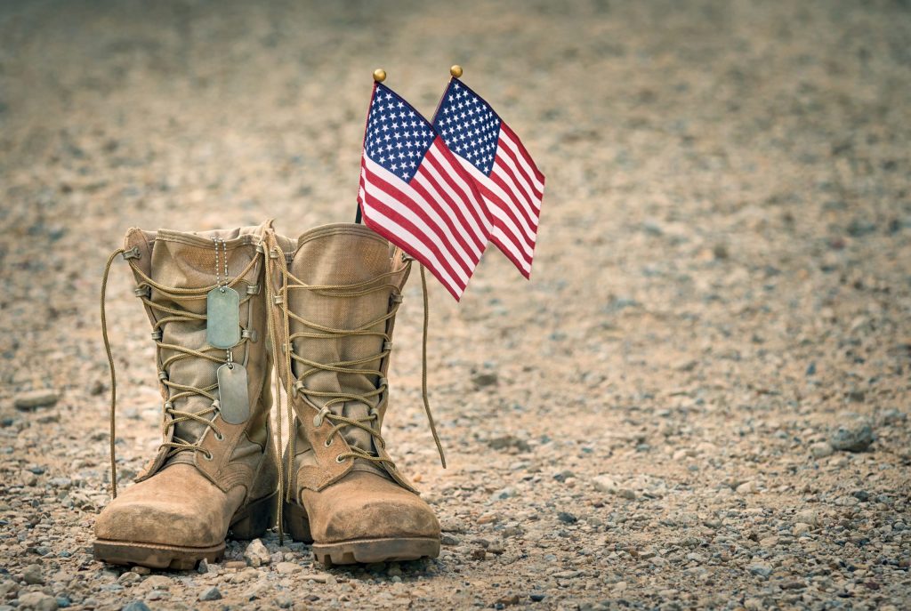 American flags inside military boots