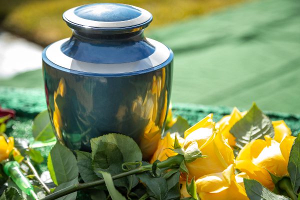 urn with flowers at funeral