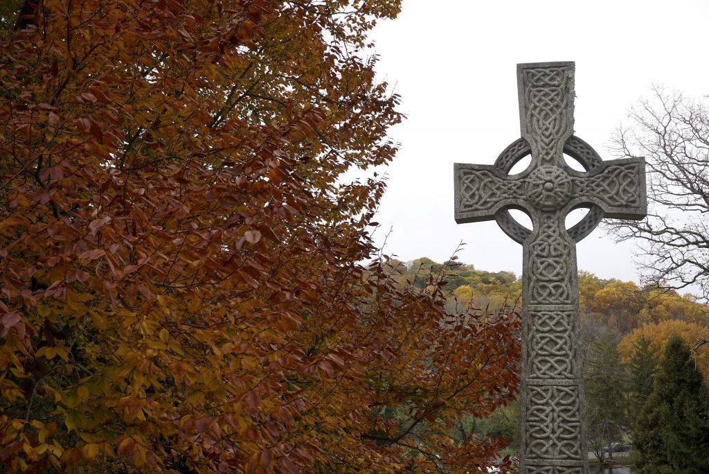 Coptic cross tombstone in cemetery