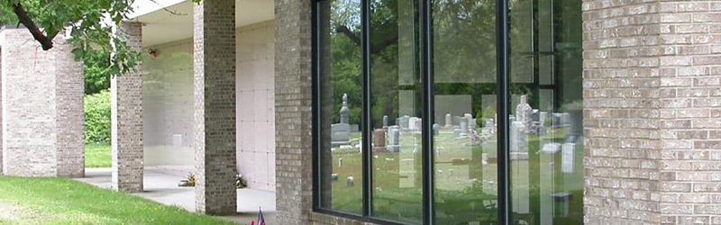 headstones image in a window reflection